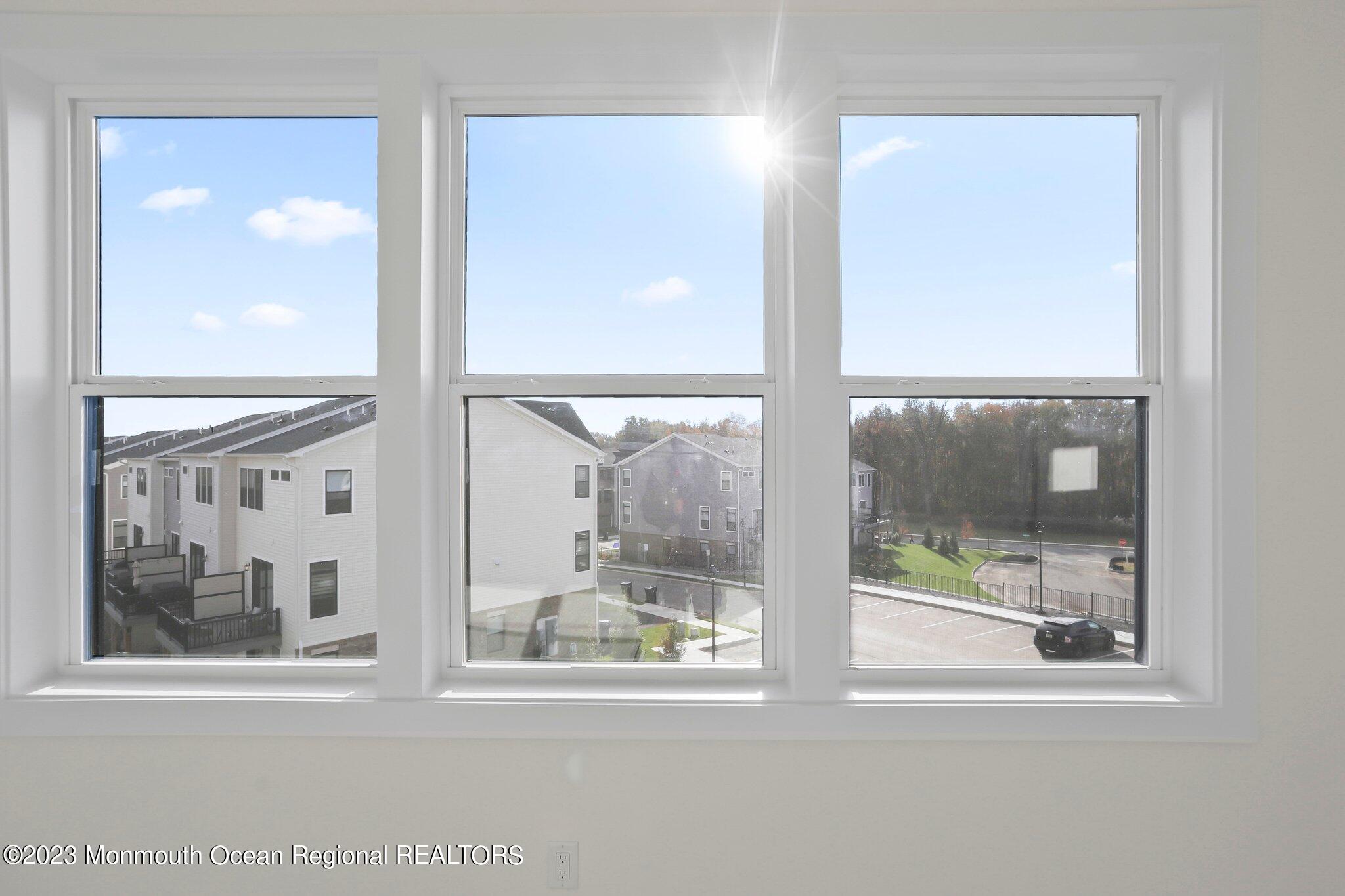 3 Valiant Court Middletown, NJ 07748 - Photo 30 of 42 a view of a glass door with a glass door and a window