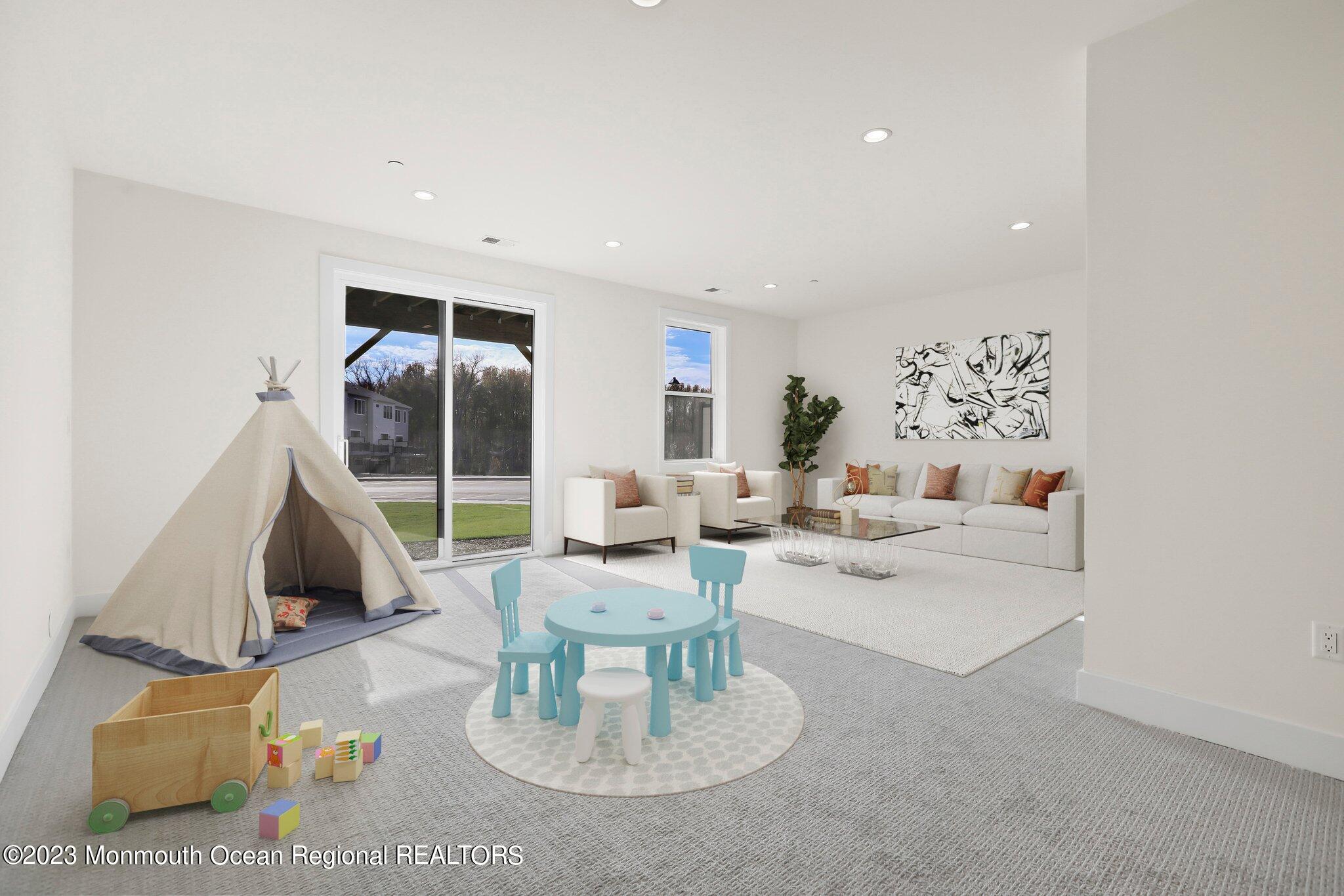 3 Valiant Court Middletown, NJ 07748 - Photo 35 of 42 a living room with furniture and wooden floor