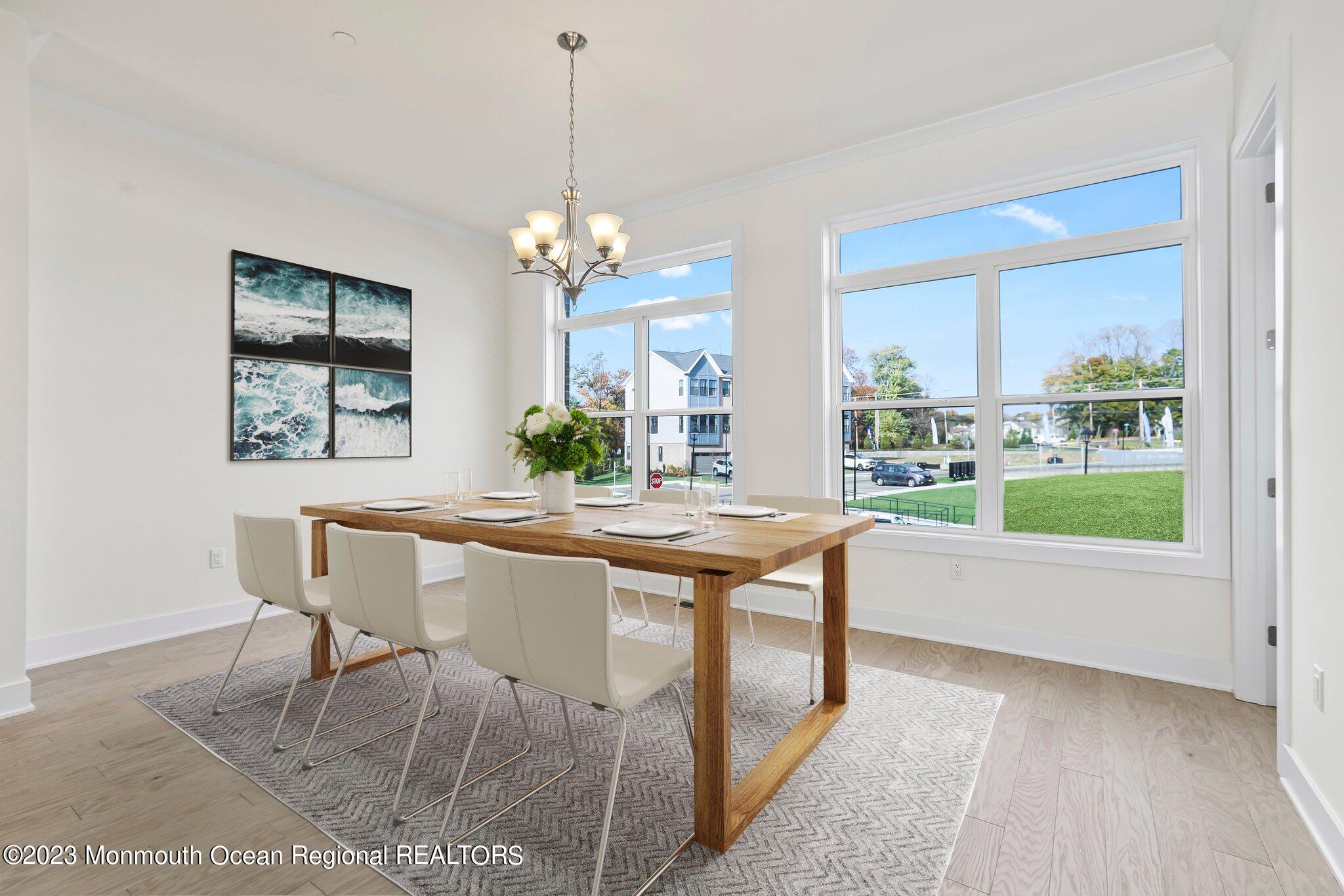 3 Valiant Court Middletown, NJ 07748 - Photo 10 of 42 a room with a table chairs and entryway