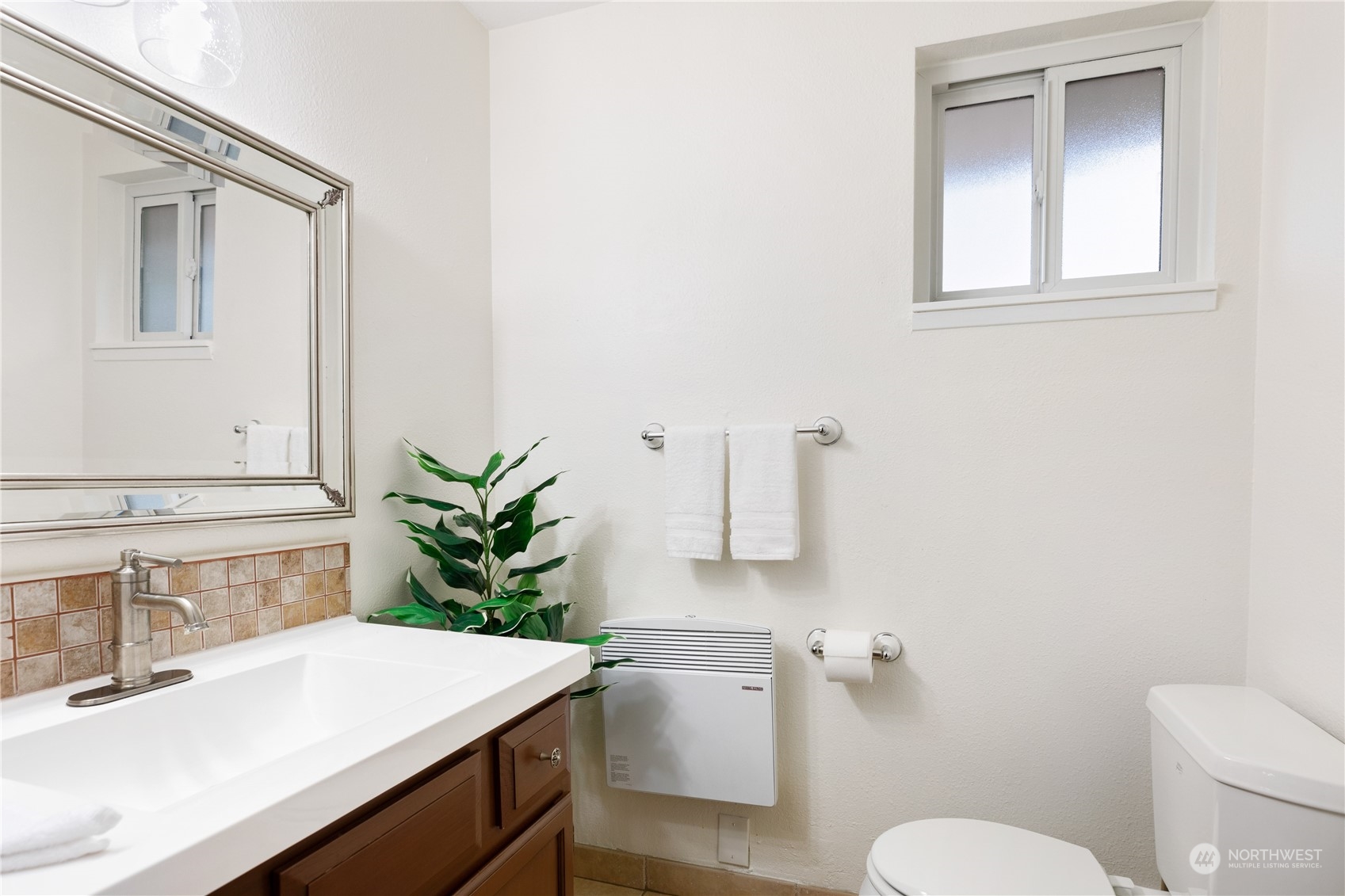 170 Denneboom Road Coupeville, WA 98239 - Photo 19 of 39 a bathroom with a sink toilet and mirror
