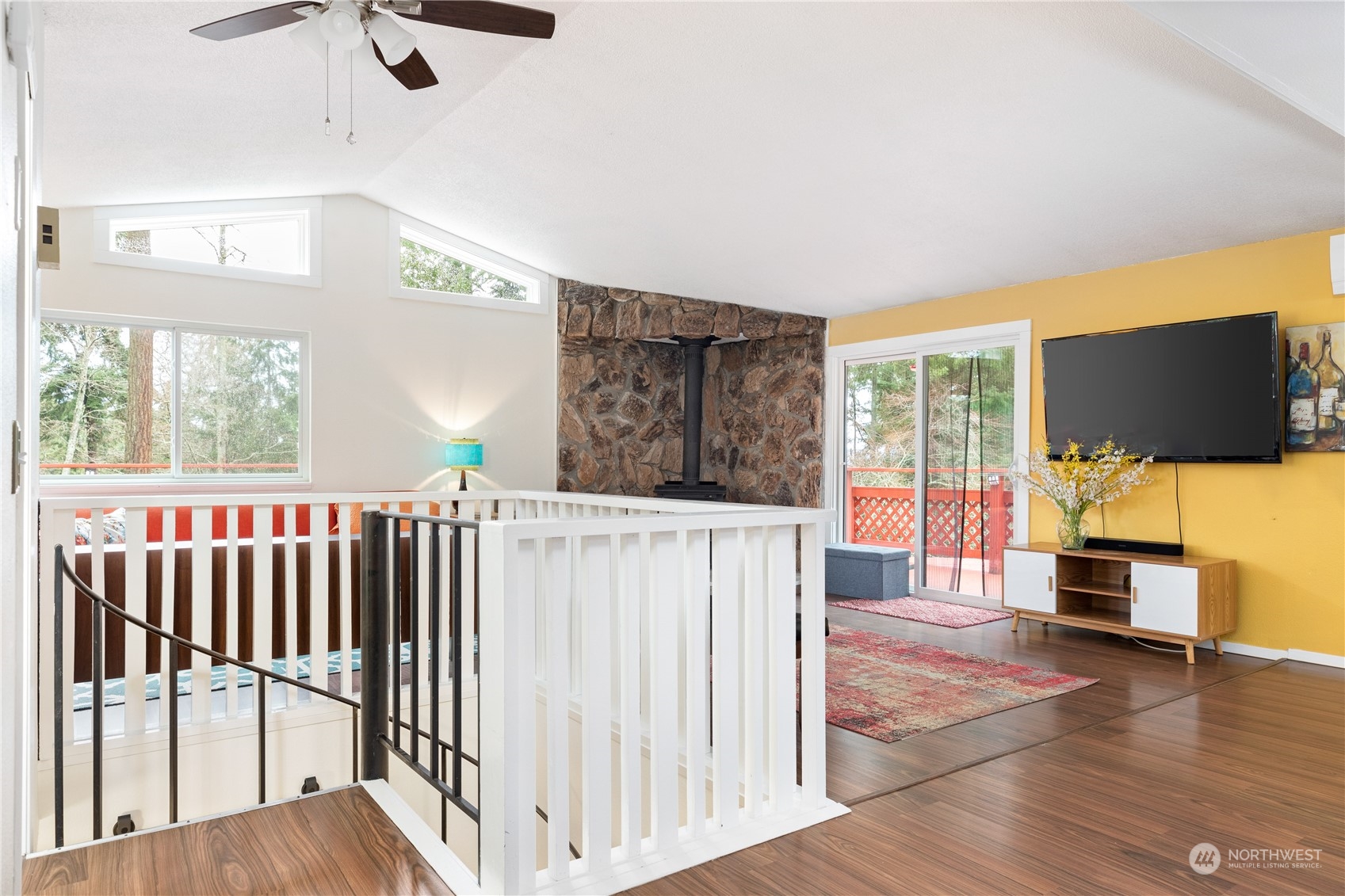 170 Denneboom Road Coupeville, WA 98239 - Photo 20 of 39 a view of a living room hardwood floor and a large window