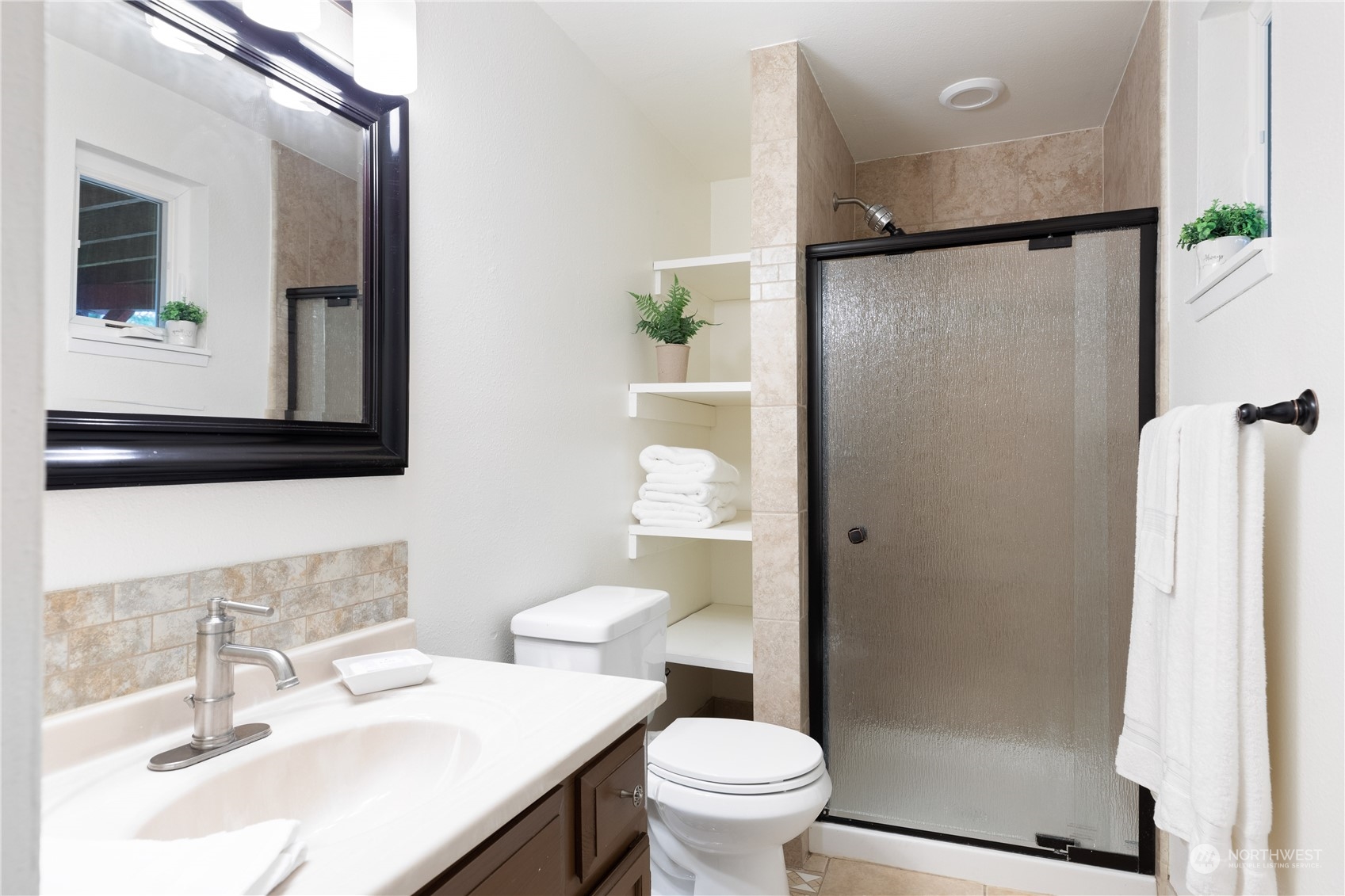 170 Denneboom Road Coupeville, WA 98239 - Photo 26 of 39 a bathroom with a sink toilet and shower
