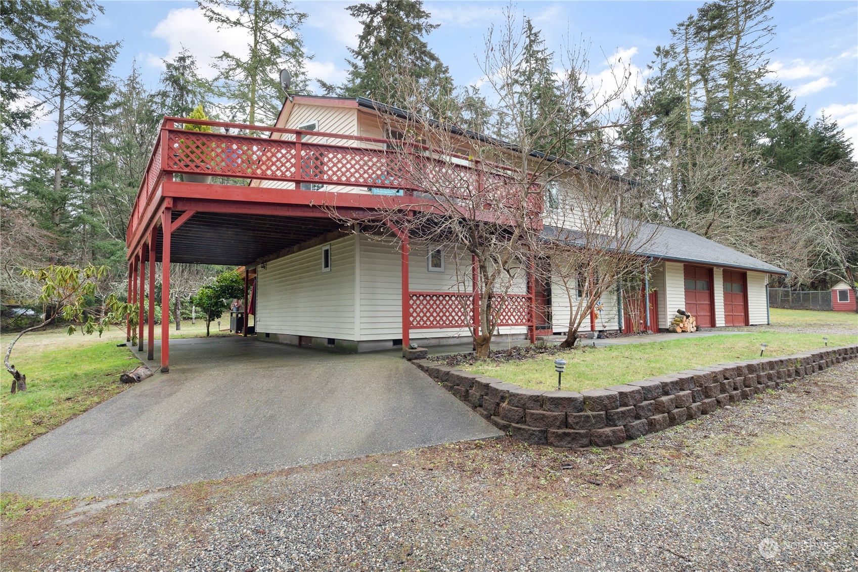 170 Denneboom Road Coupeville, WA 98239 - Photo 3 of 39 a view of a house with a yard and garage