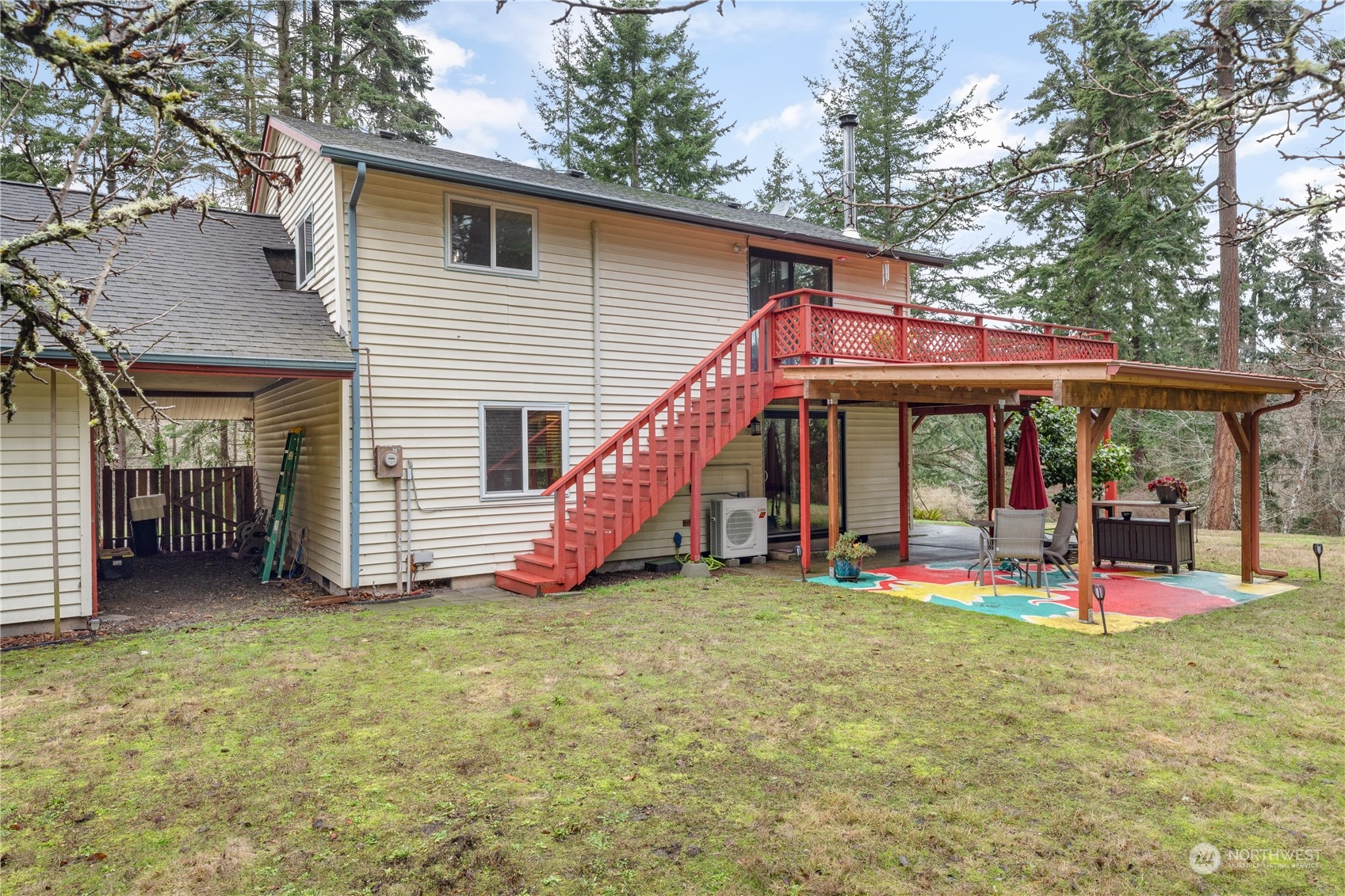 170 Denneboom Road Coupeville, WA 98239 - Photo 35 of 39 a view of a house with a yard and furniture