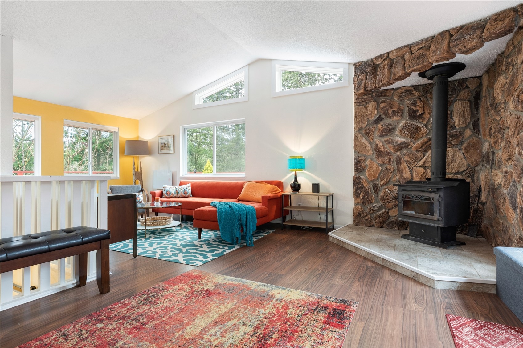 170 Denneboom Road Coupeville, WA 98239 - Photo 5 of 39 a bedroom with furniture and a fireplace