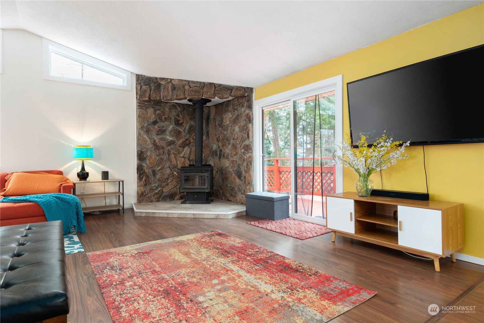 170 Denneboom Road Coupeville, WA 98239 - Photo 6 of 39 a living room with furniture and a flat screen tv