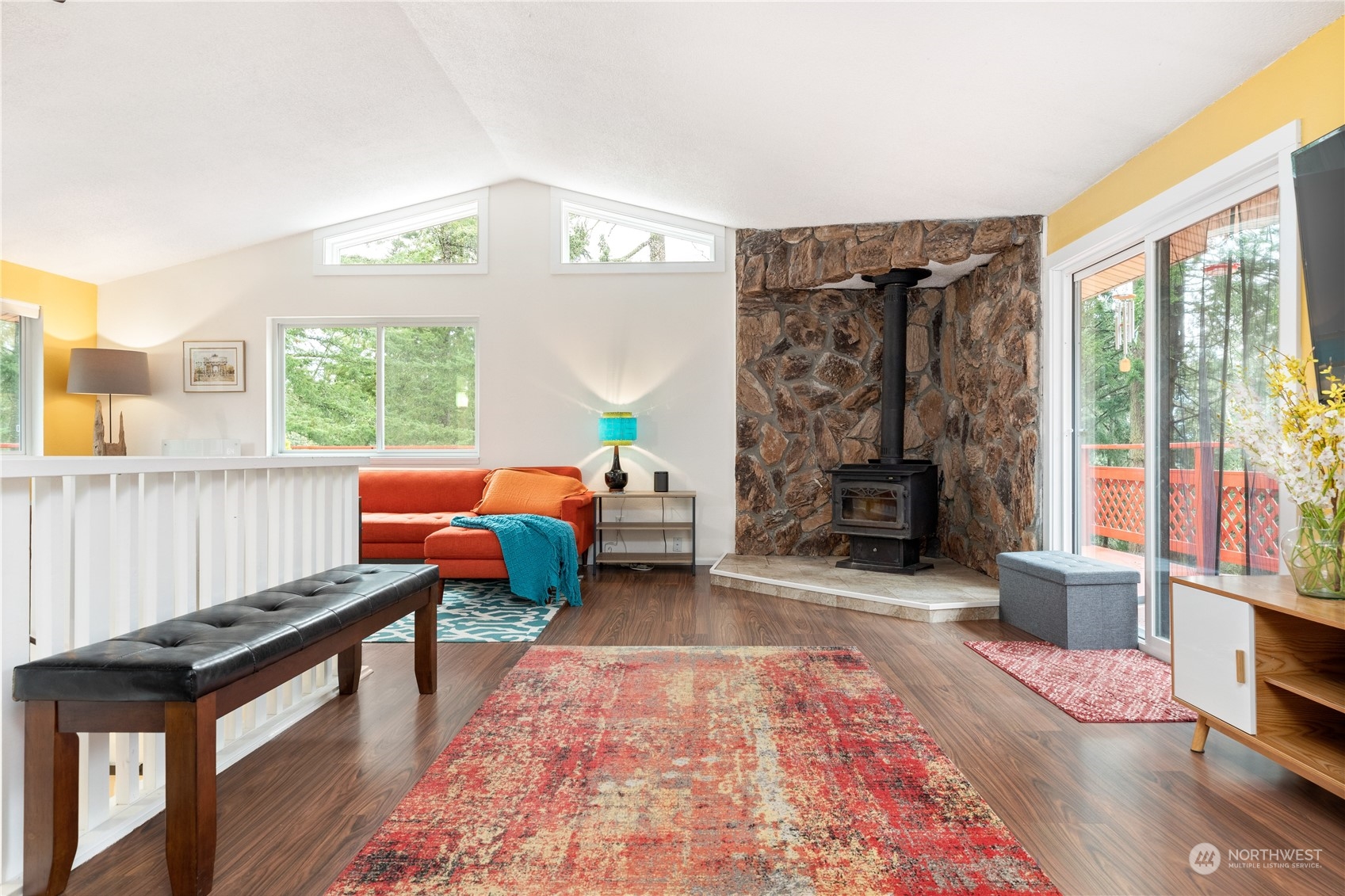 170 Denneboom Road Coupeville, WA 98239 - Photo 7 of 39 a living room with furniture and a fireplace