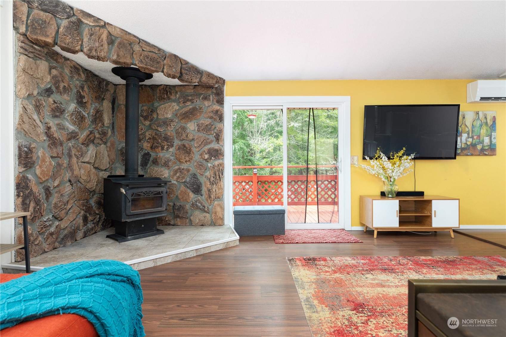 170 Denneboom Road Coupeville, WA 98239 - Photo 10 of 39 a living room with furniture and a flat screen tv