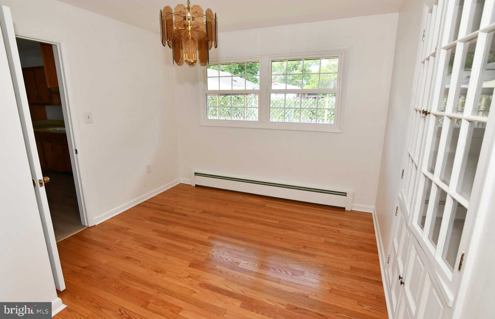 437 Beechcroft Road Winchester, VA 22601 - Photo 21 of 52 a view of a room with wooden floor and staircase