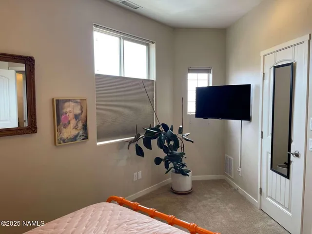 a view of a living room and a window