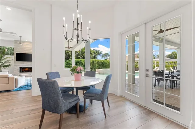 a view of an outside dining space with furniture