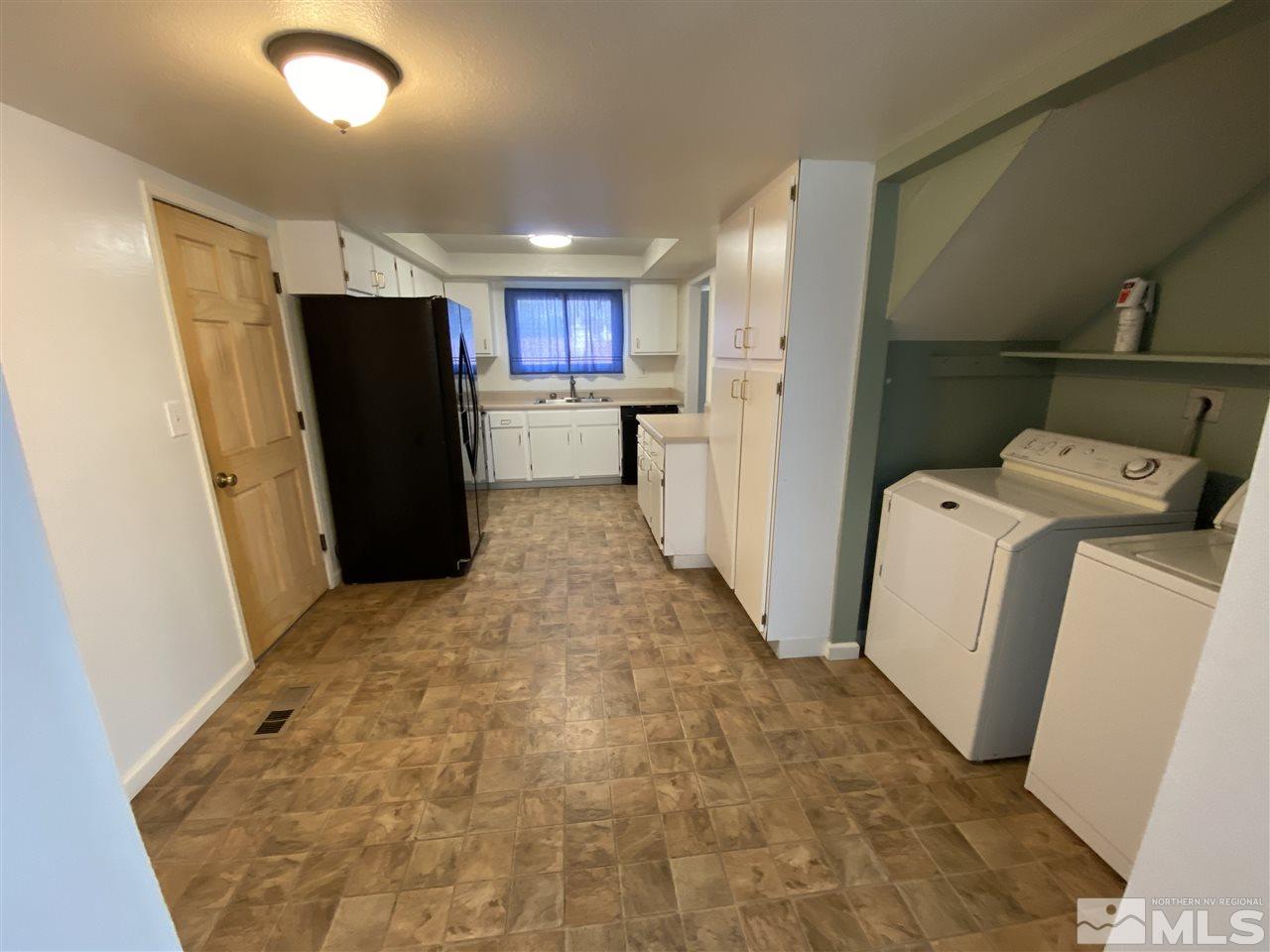 1107 Frontier Court Reno, NV 89503 - Photo 6 of 15 a view of a storage & utility room with a washer dryer