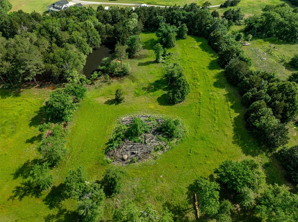 Tbd Cleve Cole Road Denison, TX 75021 - Photo 9 of 10 a view of a garden with a building