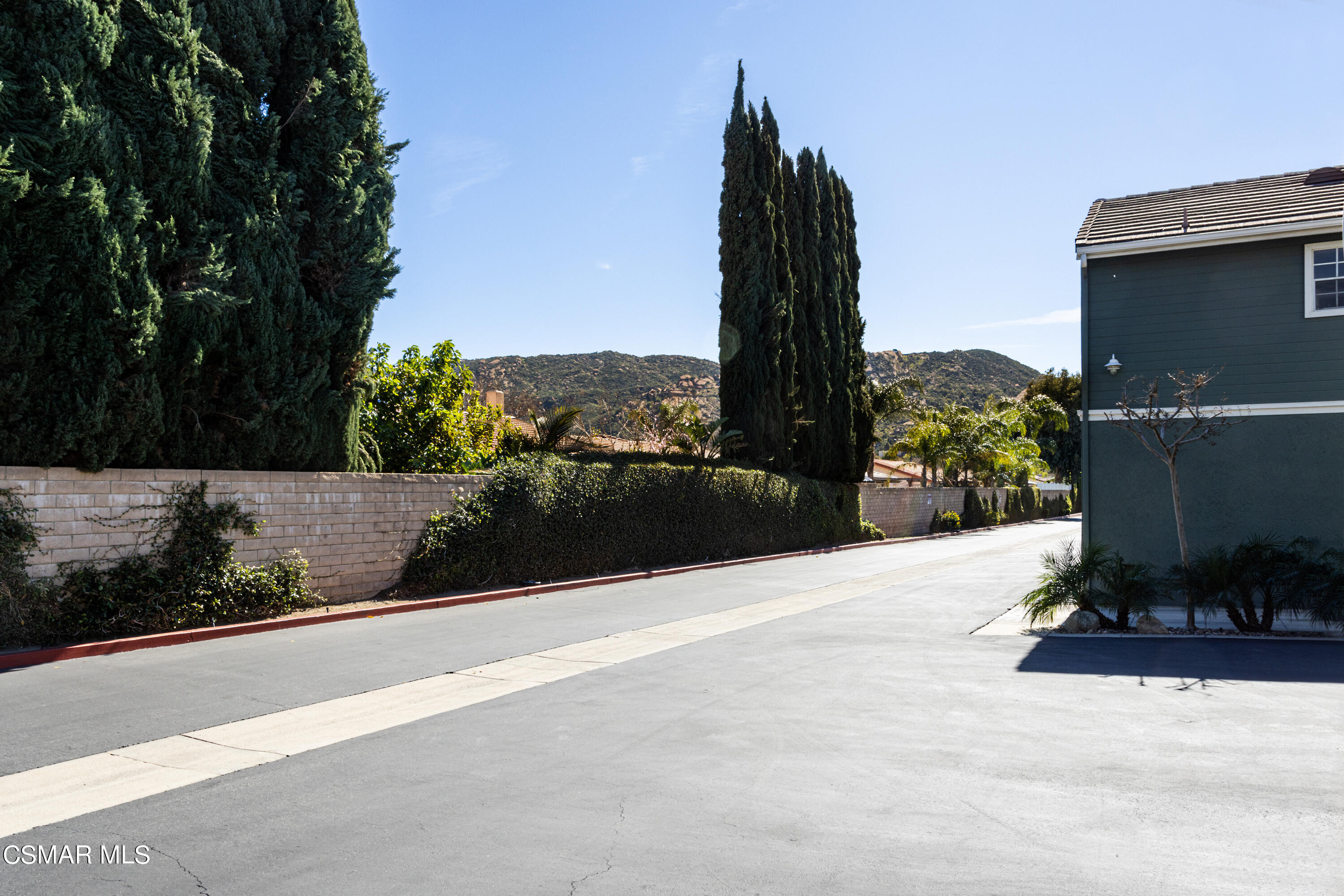 1962 Rory Lane, Unit 2 Simi Valley, CA 93063 - Photo 21 of 21 a view of a terrace with a garden