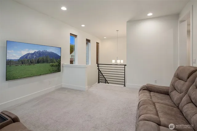 a view of livingroom with furniture and stairs