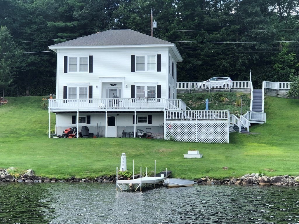 7 South Charlton Shore Road Charlton, MA 01507 - Photo 1 of 42 a view of a house with backyard and garden