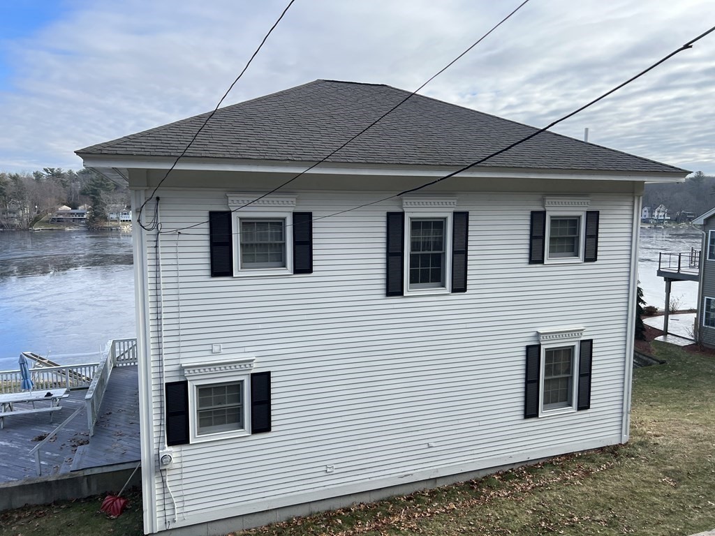 7 South Charlton Shore Road Charlton, MA 01507 - Photo 14 of 42 a front view of a house with windows