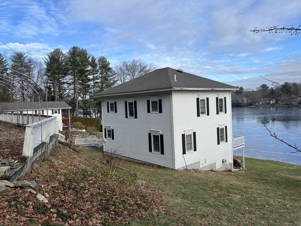 7 South Charlton Shore Road Charlton, MA 01507 - Photo 16 of 42 a view of a house with a yard