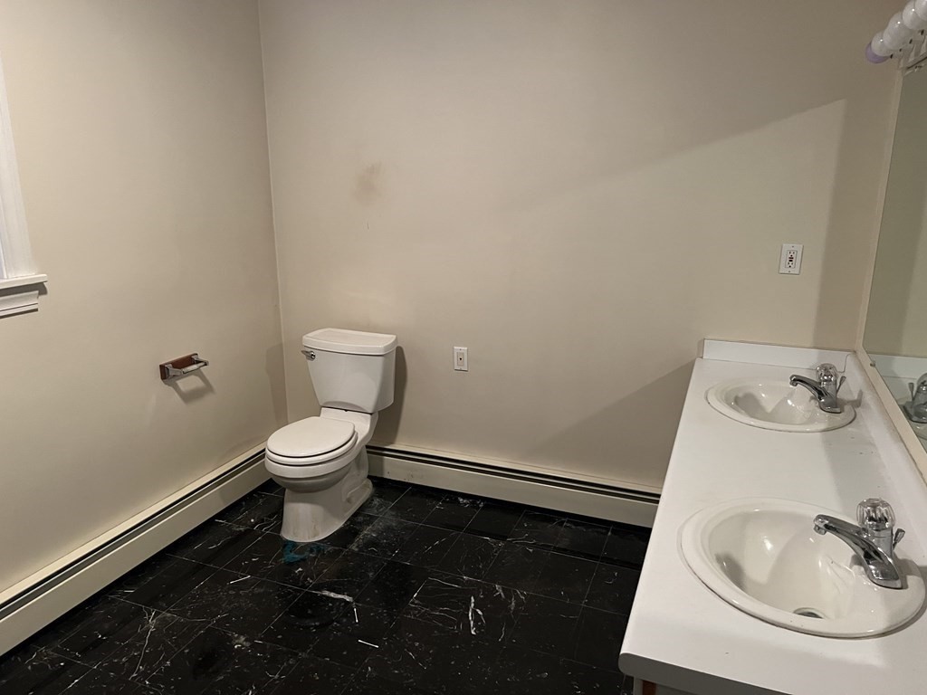 7 South Charlton Shore Road Charlton, MA 01507 - Photo 19 of 42 a bathroom with a sink and a toilet