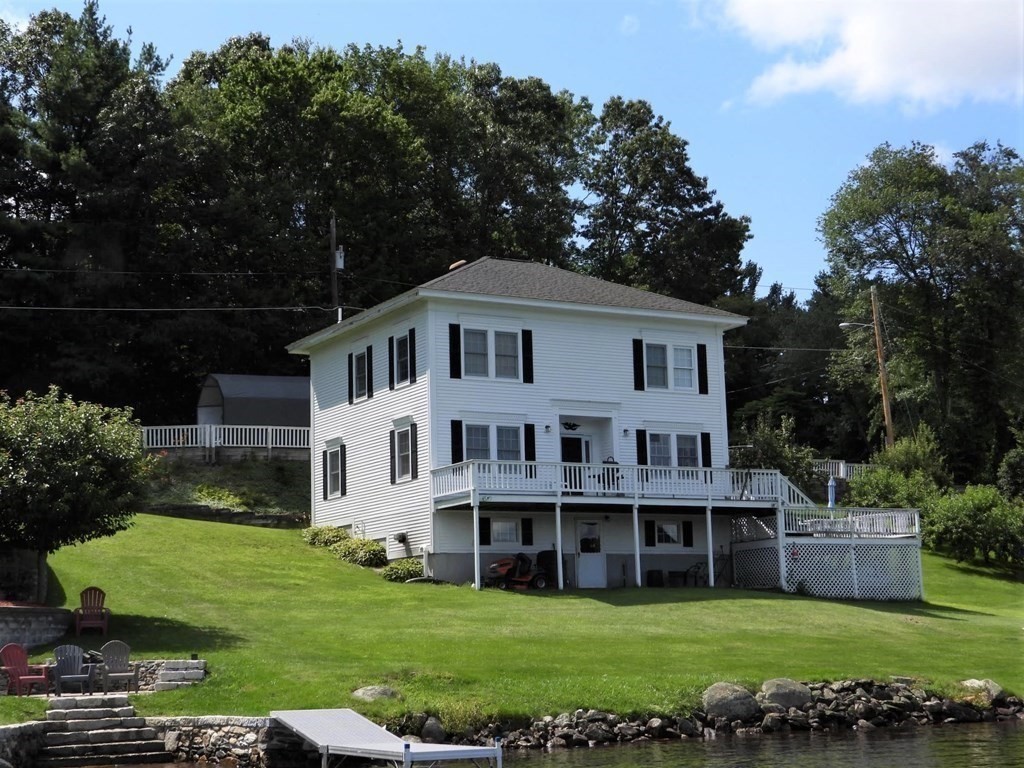 7 South Charlton Shore Road Charlton, MA 01507 - Photo 2 of 42 a view of a house with a yard and plants