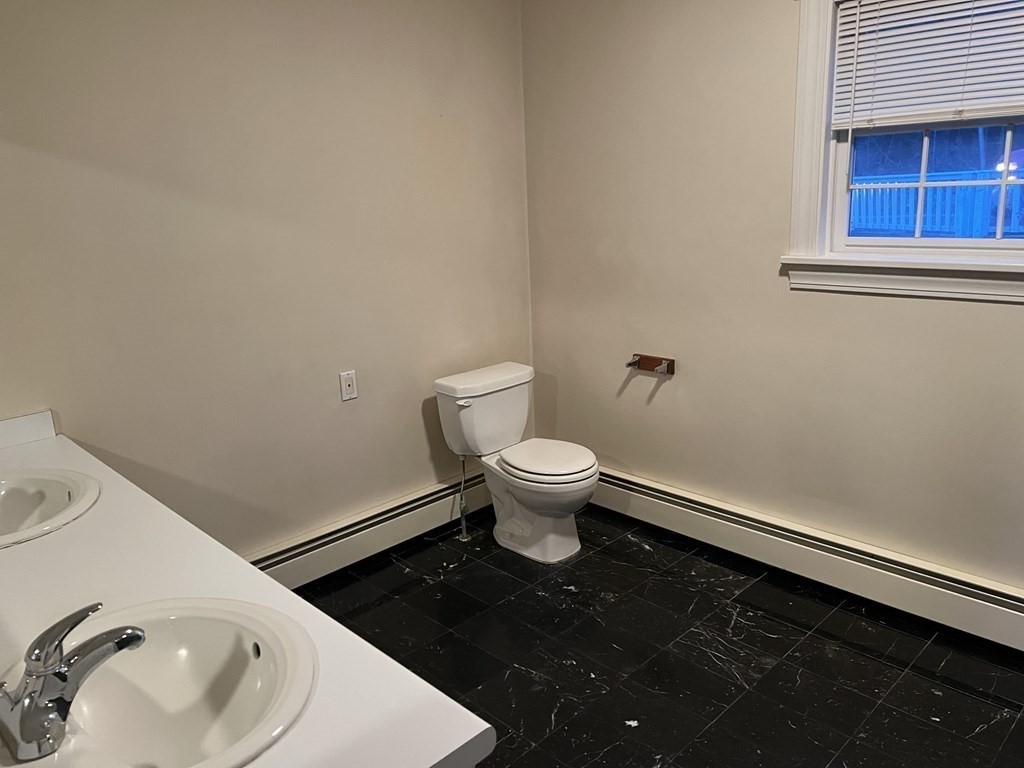 7 South Charlton Shore Road Charlton, MA 01507 - Photo 21 of 42 a bathroom with a sink and a toilet