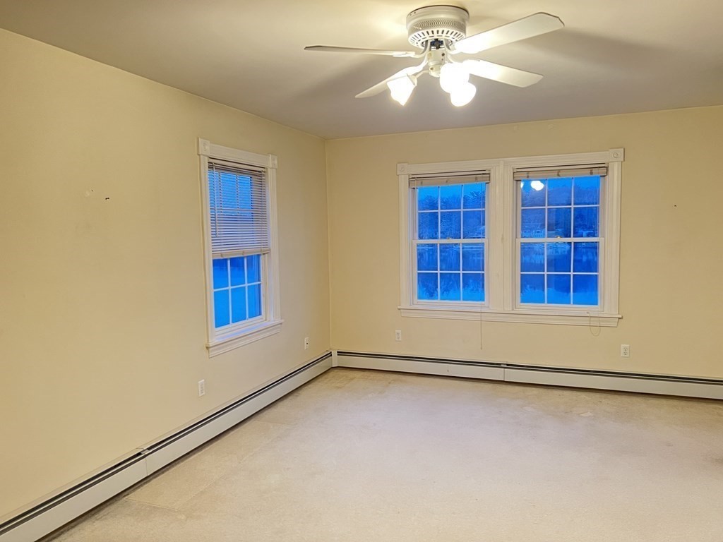 7 South Charlton Shore Road Charlton, MA 01507 - Photo 25 of 42 a view of an empty room with a window