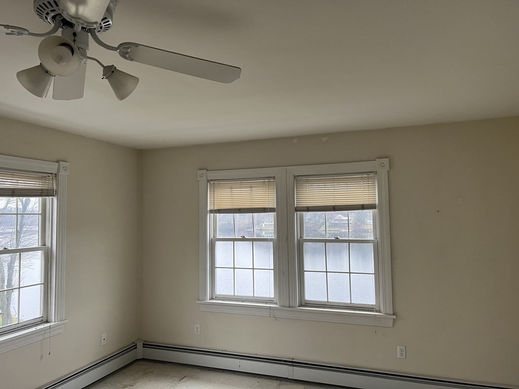 7 South Charlton Shore Road Charlton, MA 01507 - Photo 30 of 42 a view of an empty room with a window