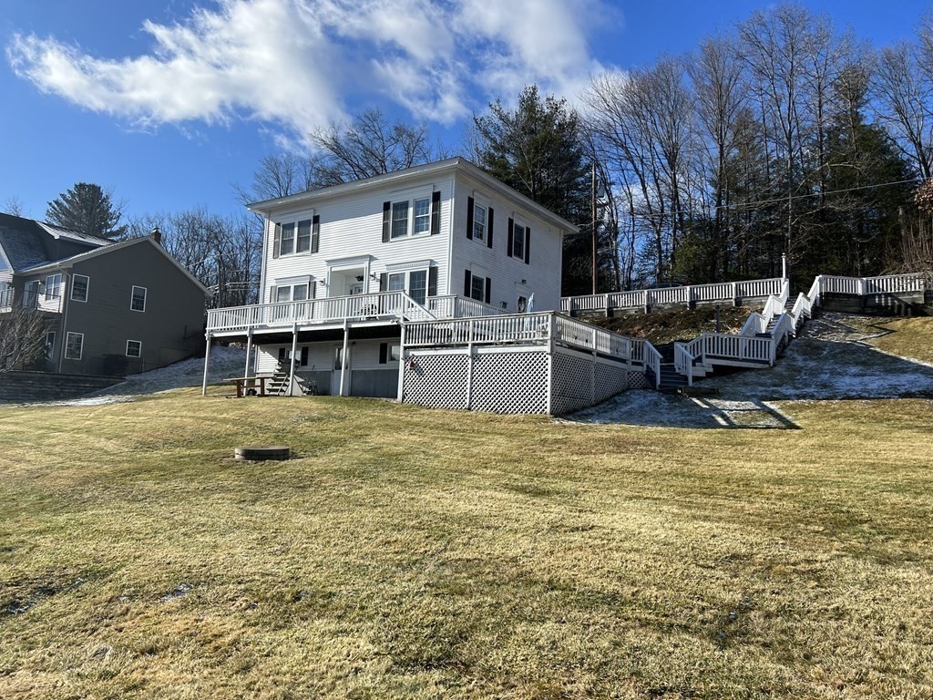 7 South Charlton Shore Road Charlton, MA 01507 - Photo 5 of 42 a view of a house with pool and chairs