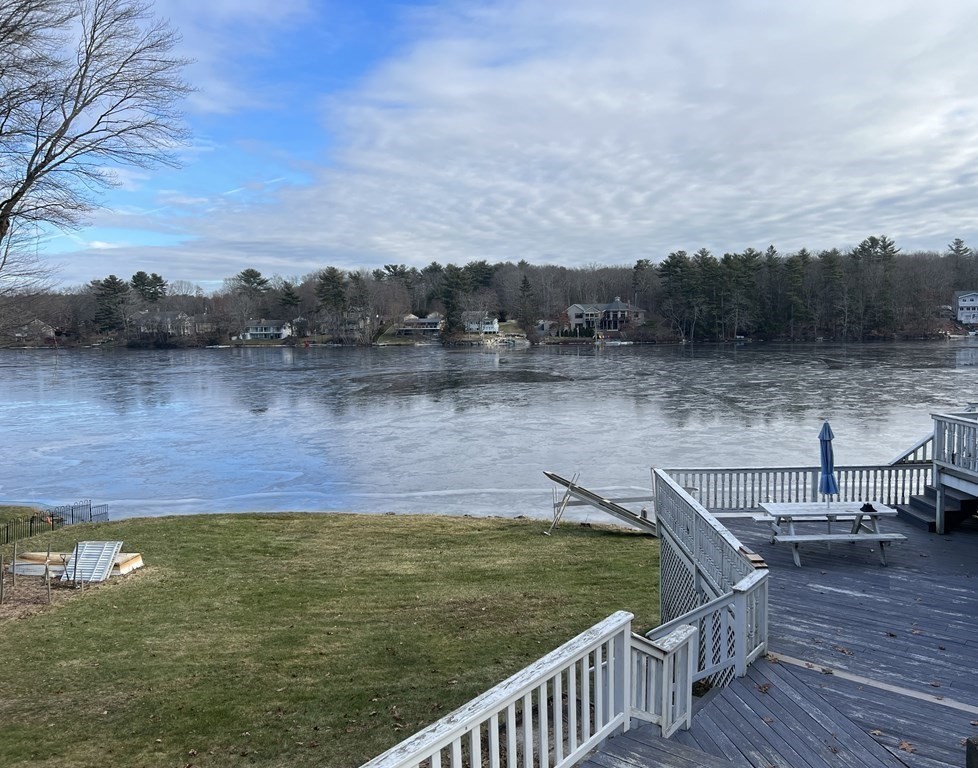 7 South Charlton Shore Road Charlton, MA 01507 - Photo 9 of 42 a view of a lake with houses in the back