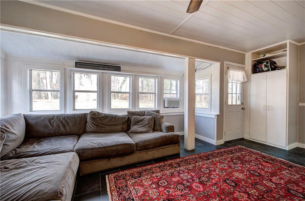 2023 Fate Conn Road Canton, GA 30114 - Photo 12 of 59 a living room with furniture and a couch