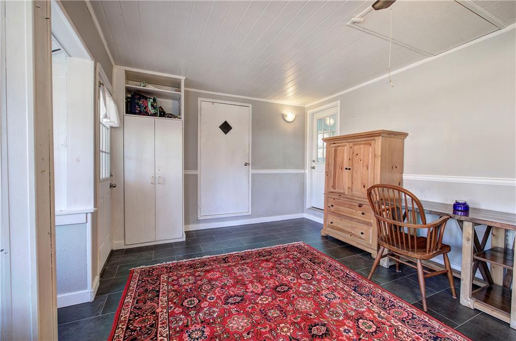 2023 Fate Conn Road Canton, GA 30114 - Photo 13 of 59 a bedroom with furniture and a rug
