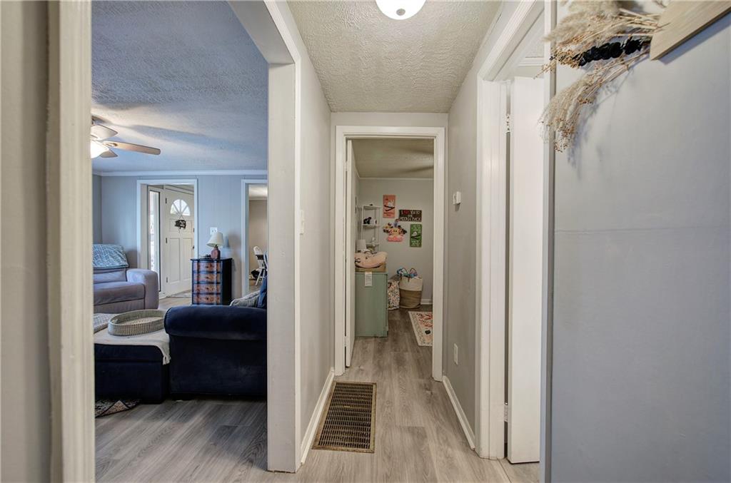 2023 Fate Conn Road Canton, GA 30114 - Photo 19 of 59 a view of a bedroom from a hallway