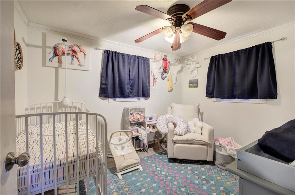 2023 Fate Conn Road Canton, GA 30114 - Photo 20 of 59 a living room with furniture and a window