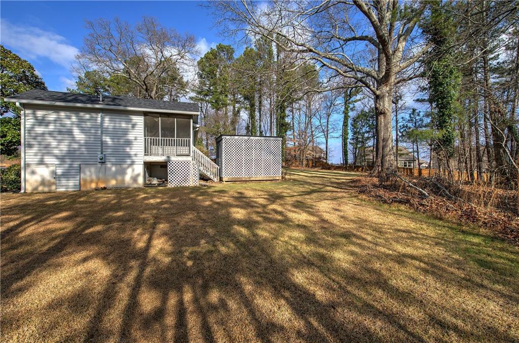2023 Fate Conn Road Canton, GA 30114 - Photo 31 of 59 a view of a house with a outdoor space