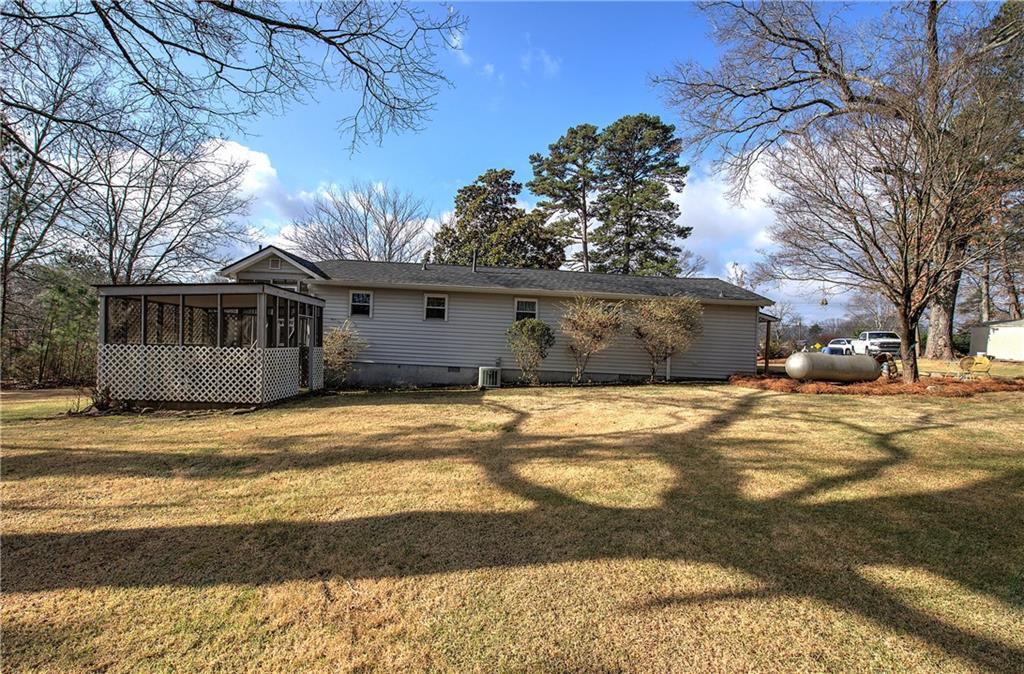 2023 Fate Conn Road Canton, GA 30114 - Photo 34 of 59 a view of a house with snow on the road