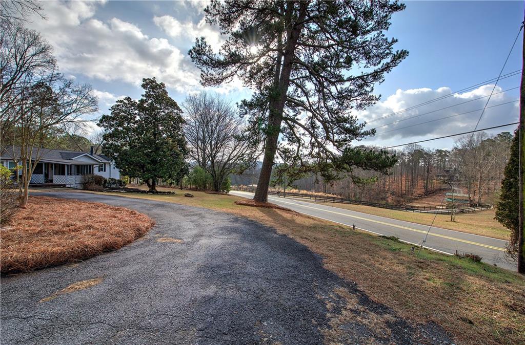 2023 Fate Conn Road Canton, GA 30114 - Photo 45 of 59 a view of a yard with plants and trees