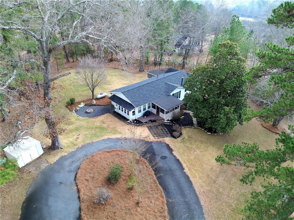 2023 Fate Conn Road Canton, GA 30114 - Photo 52 of 59 an aerial view of a house with a yard