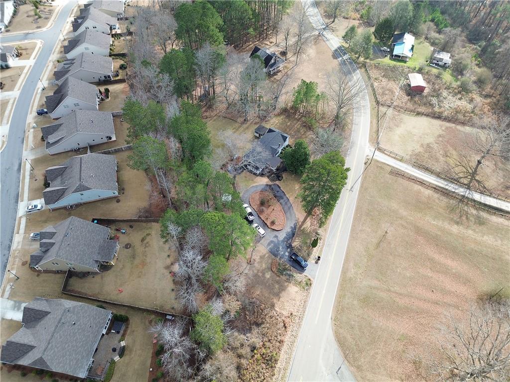 2023 Fate Conn Road Canton, GA 30114 - Photo 56 of 59 an aerial view of residential houses with outdoor space