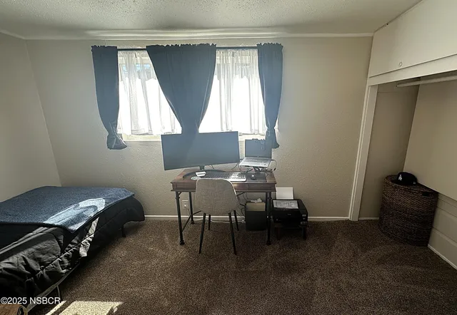 a view of entryway and hall with a sink