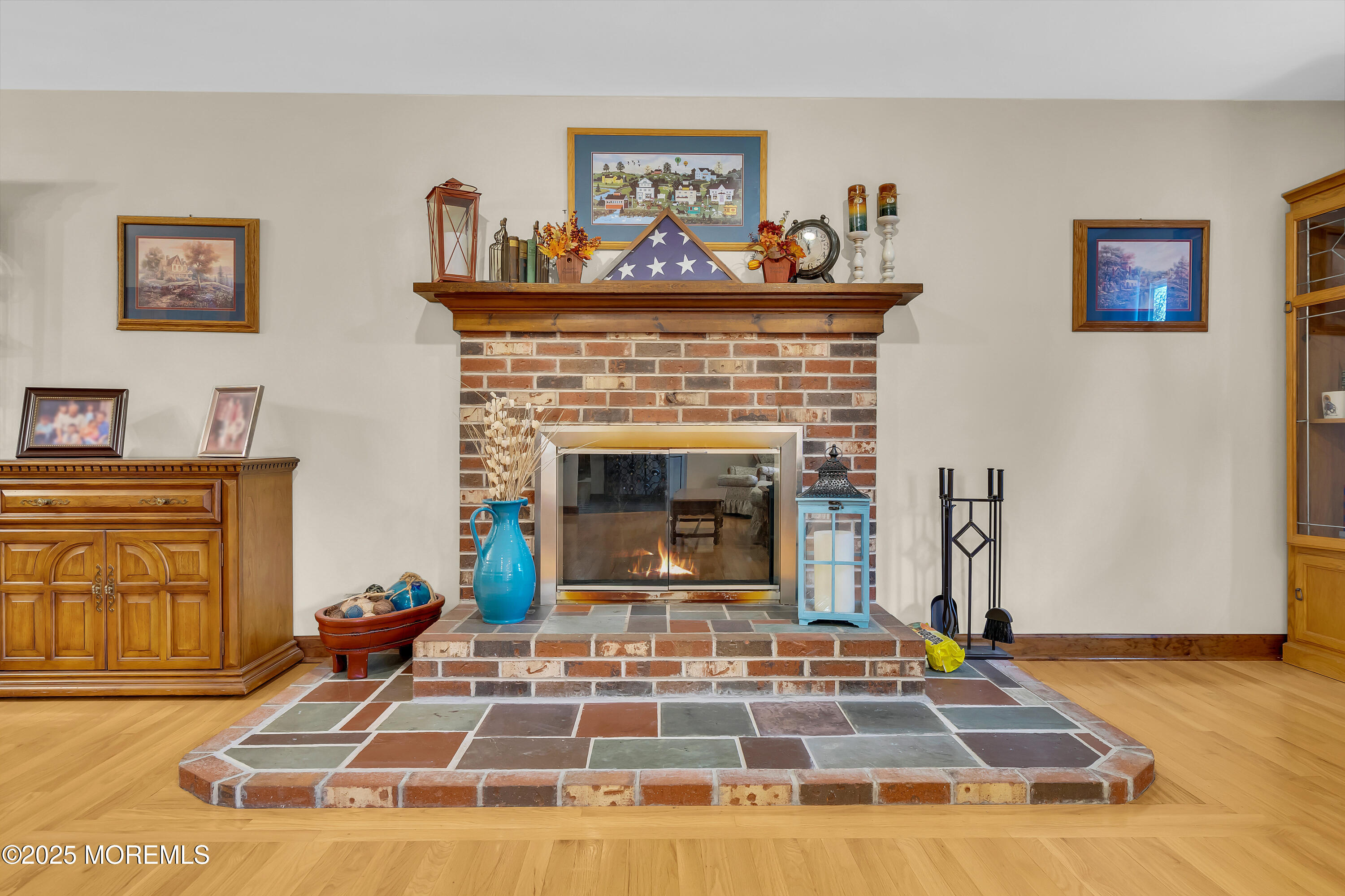 49 Highbridge Road New Egypt, NJ 08533 - Photo 11 of 44 a living room with furniture and a fireplace