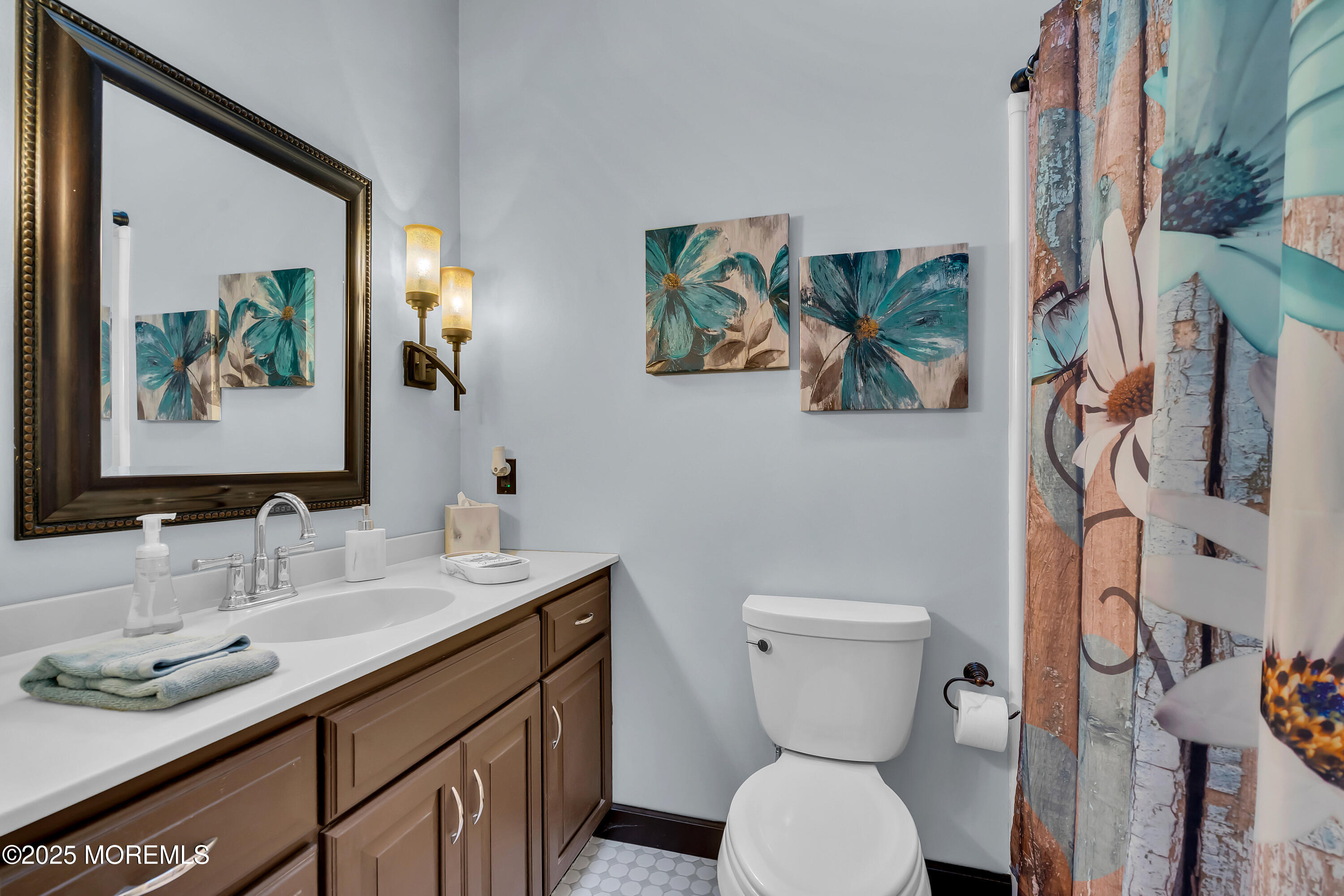 49 Highbridge Road New Egypt, NJ 08533 - Photo 25 of 44 a bathroom with a toilet sink and mirror