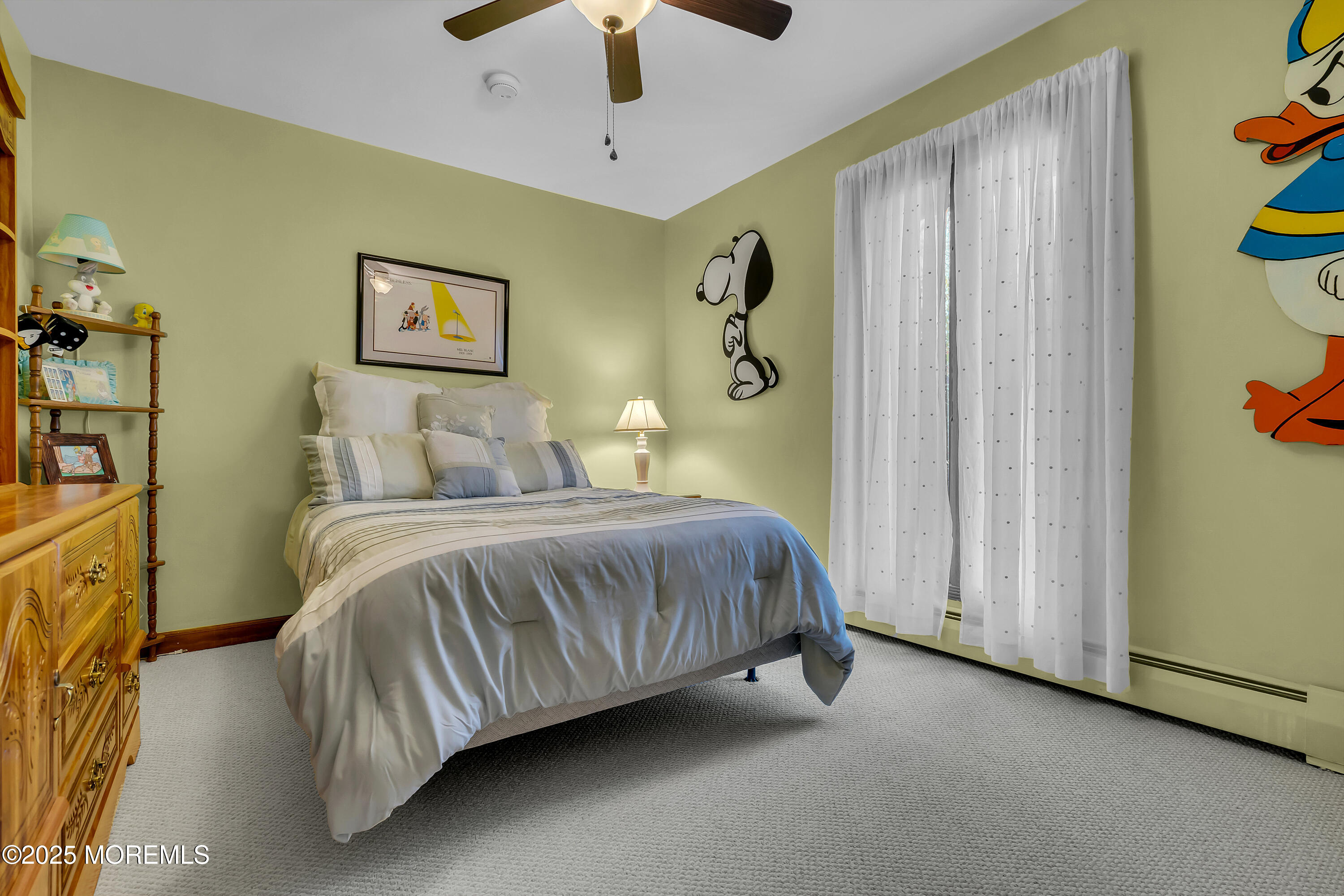 49 Highbridge Road New Egypt, NJ 08533 - Photo 26 of 44 a bedroom with a bed and a chandelier