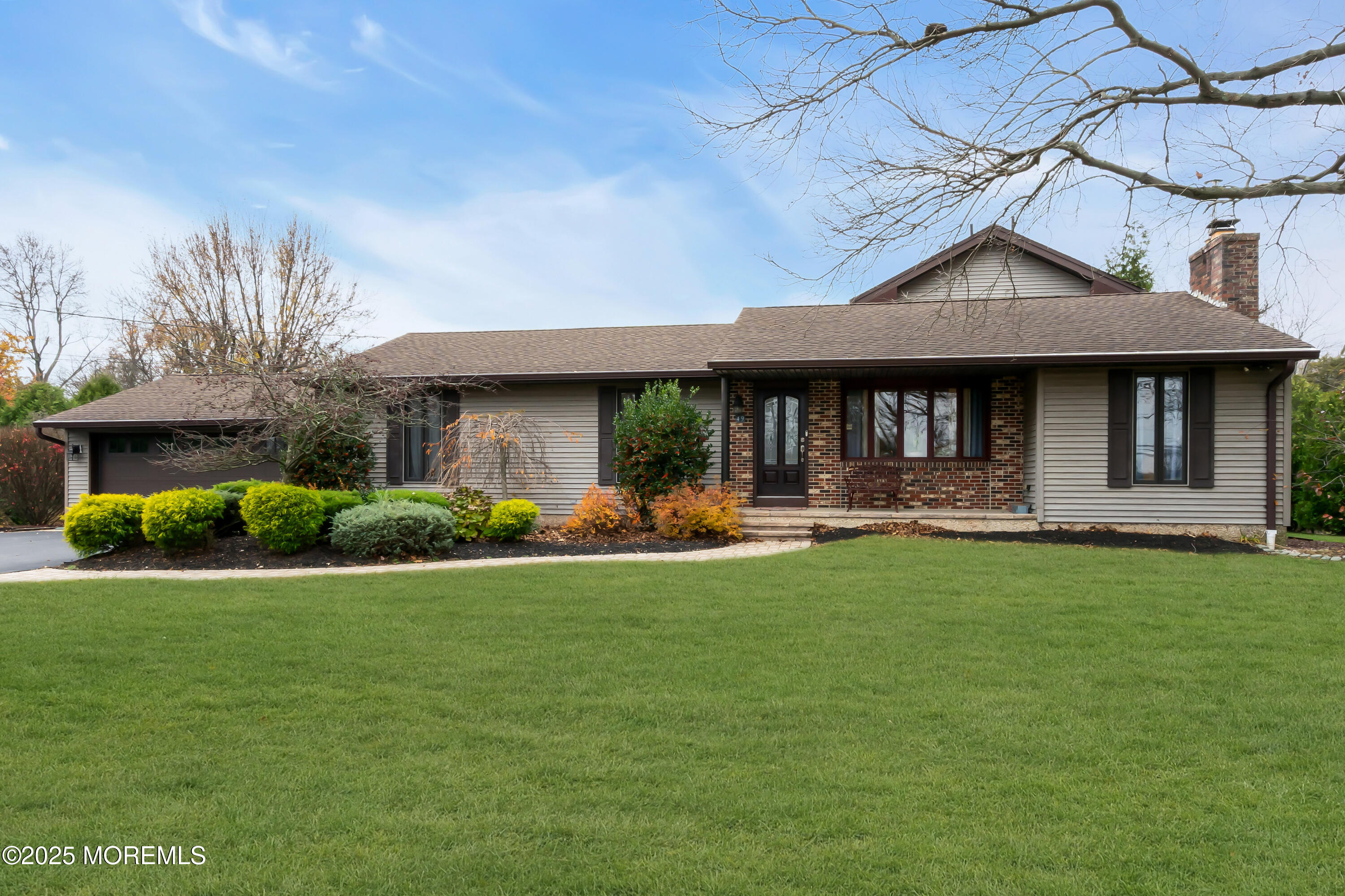 49 Highbridge Road New Egypt, NJ 08533 - Photo 3 of 44 a front view of a house with swimming pool having outdoor seating