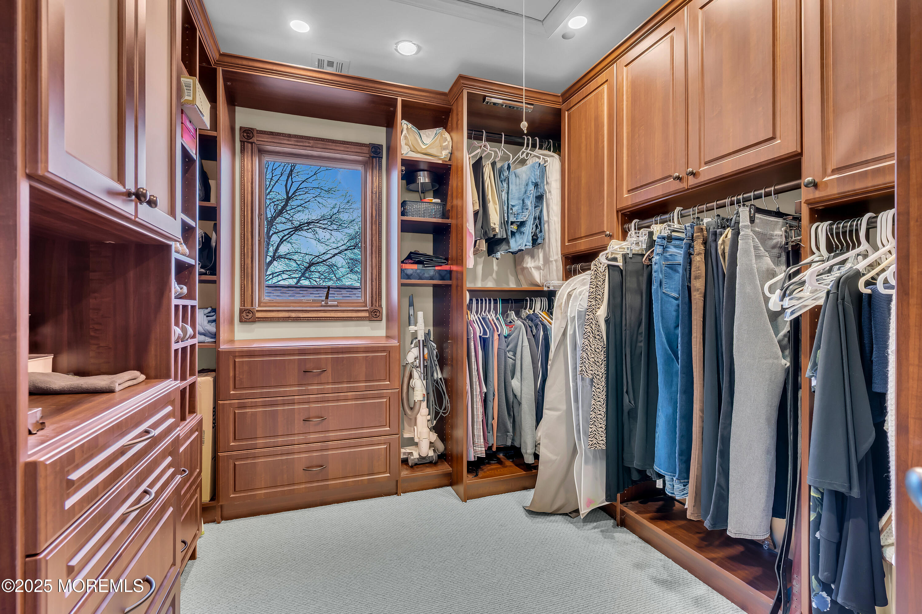 49 Highbridge Road New Egypt, NJ 08533 - Photo 35 of 44 a view of walk in closet with clothes and shoes