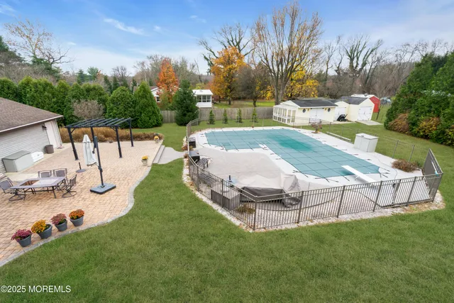 a view of a house with a big yard