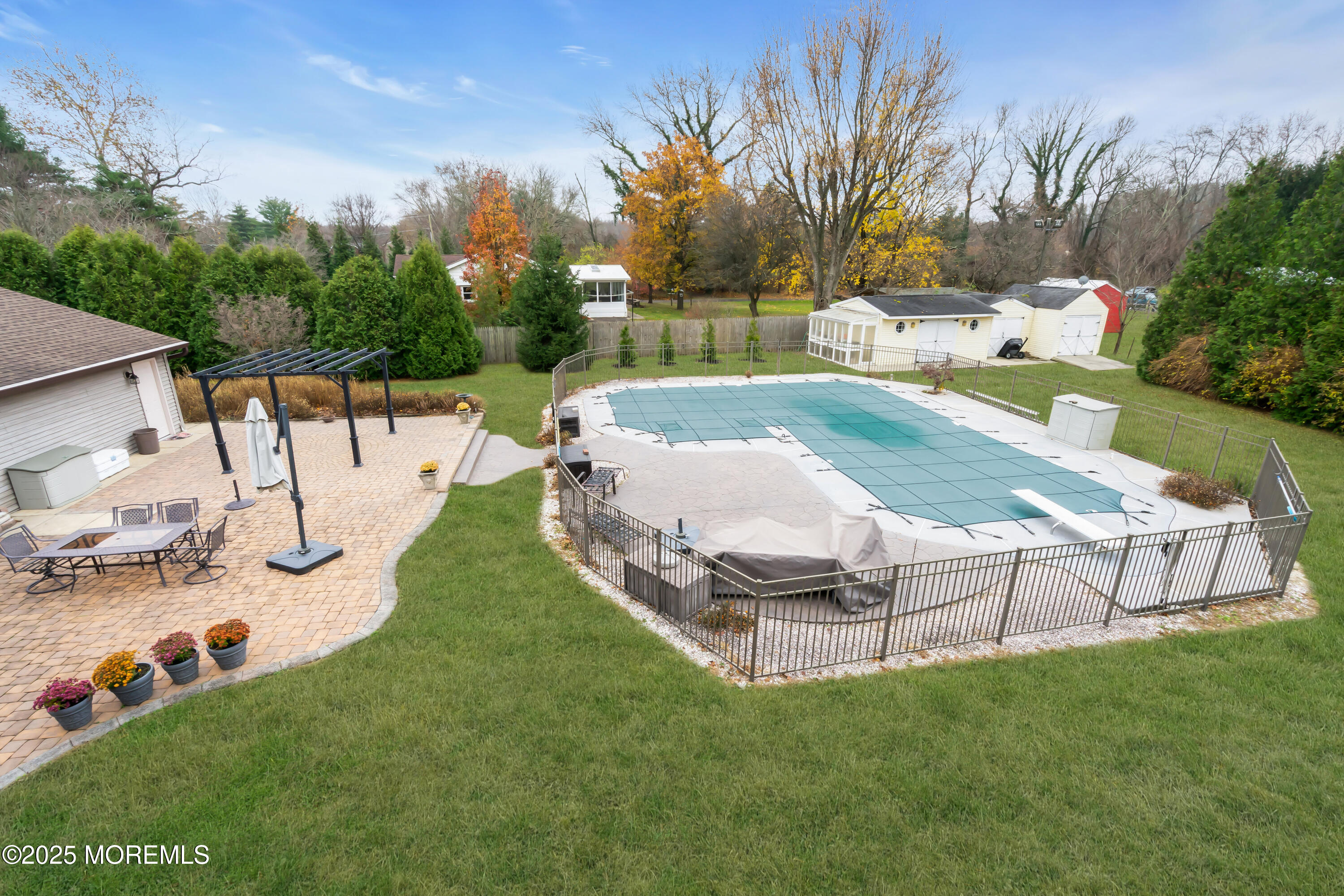 49 Highbridge Road New Egypt, NJ 08533 - Photo 41 of 44 a view of a backyard with swimming pool