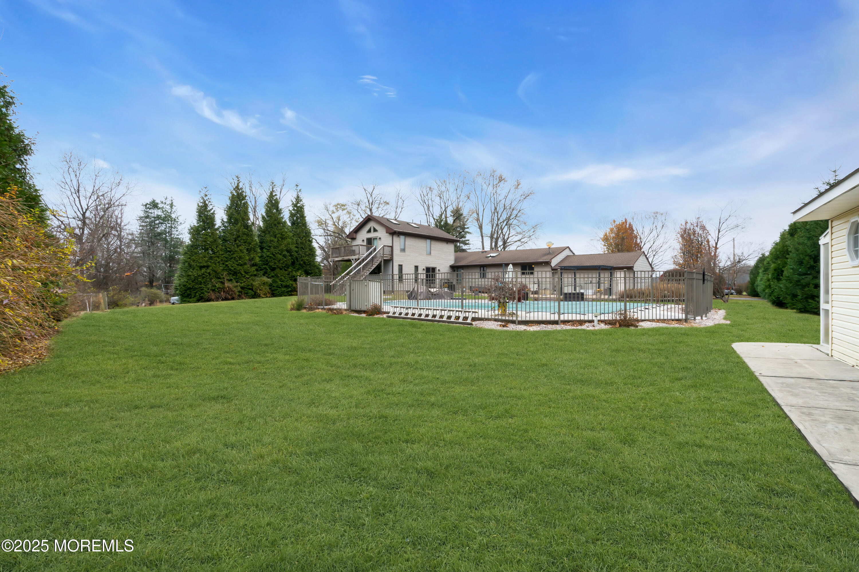 49 Highbridge Road New Egypt, NJ 08533 - Photo 44 of 44 a view of a house with a yard
