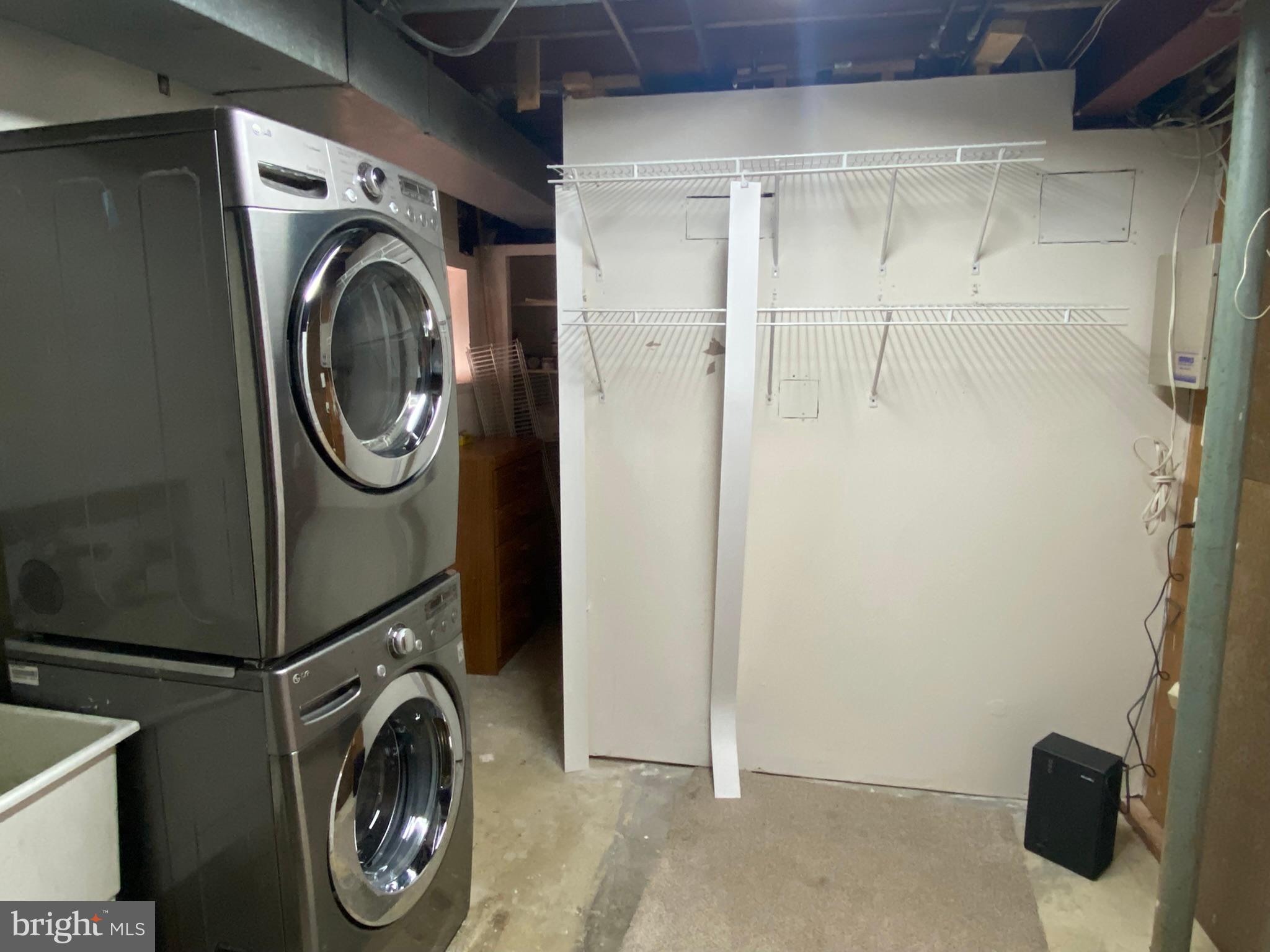 7432 Pohick Road Lorton, VA 22079 - Photo 13 of 27 a utility room with dryer and washer