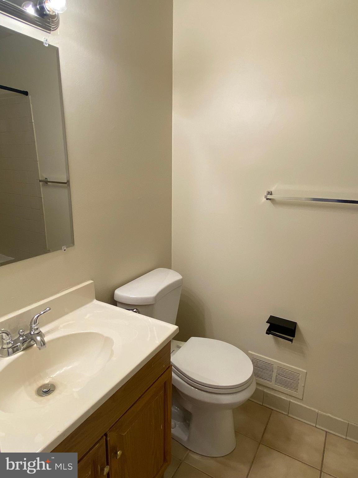 7432 Pohick Road Lorton, VA 22079 - Photo 21 of 27 a bathroom with a sink and a toilet