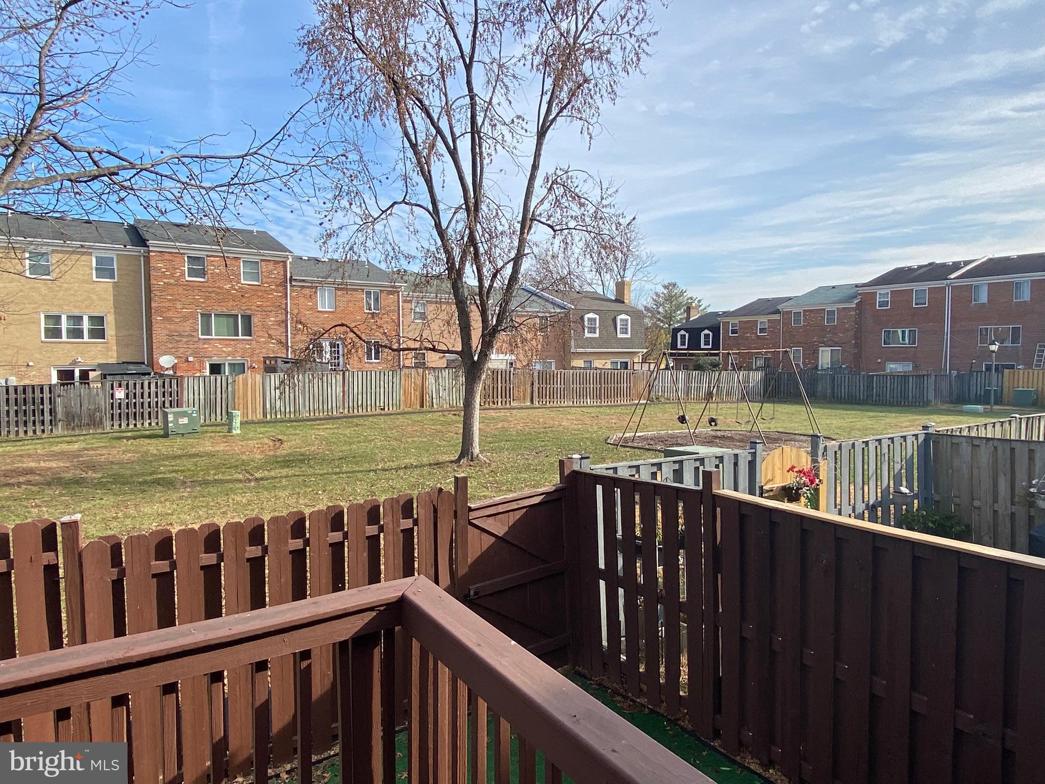 7432 Pohick Road Lorton, VA 22079 - Photo 27 of 27 a view of a balcony with wooden floor and outdoor space